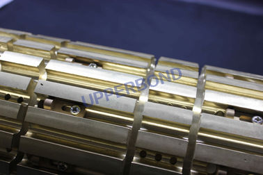 Kupfer - hergestellte Receival-Trommel zusammengebaut zwischen Zigaretten-Rod-Maschine und Filter-Maschine